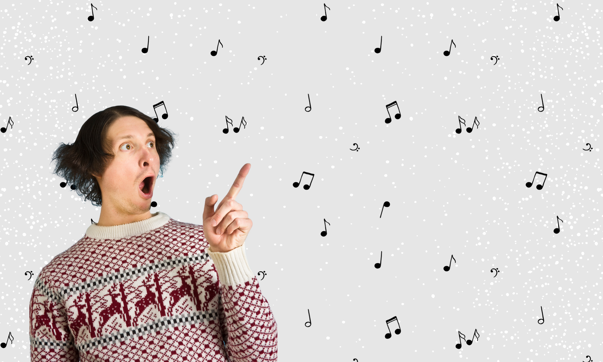 A quirky guy in a Christmas sweater pointing to music notes.
